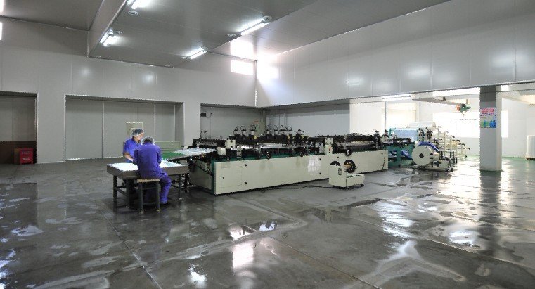 Flexible packaging bag making line