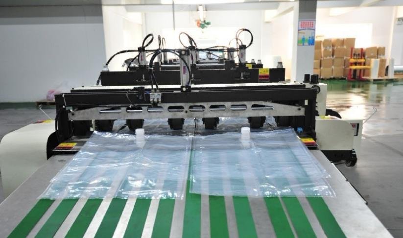 Finished pouch output on a bag making machine